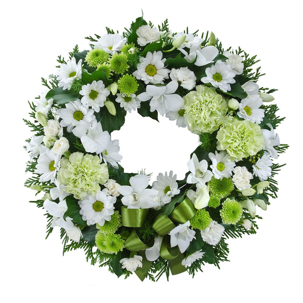 White & Green Cluster Wreath

This cluster wreath features classic flowers in white, pale green, and mid green tones. This beautiful floral tribute is ideal to help you pay your respects.
Suitable for delivery to service only (not suitable for delivery to home).

Flowers may vary from the image displayed due to seasonal availability. We'll craft an arrangement which is similar in style using seasonal flowers that is equal or greater in value. 